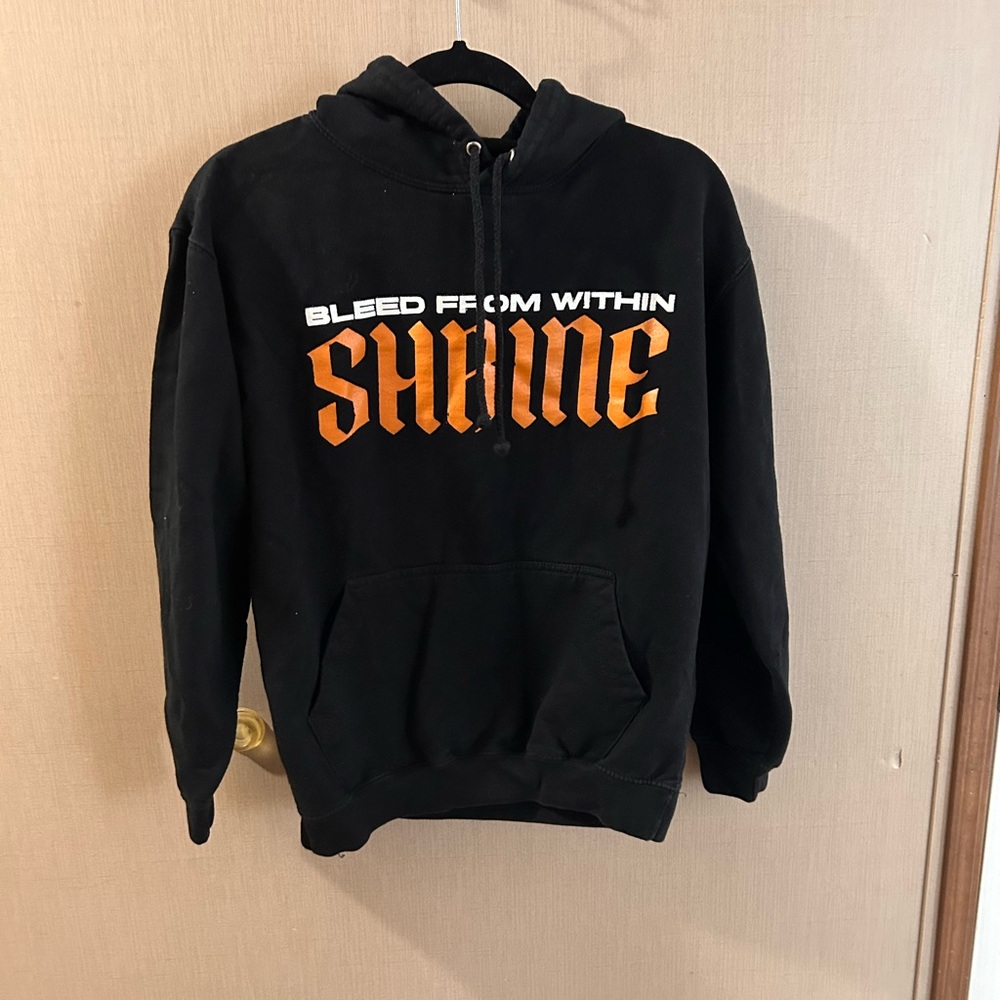Black Hoodie with Orange 'SHINE' Print